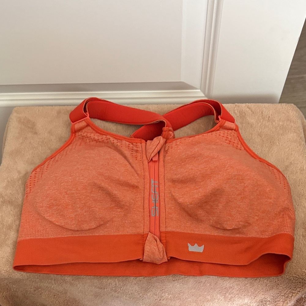 SHEFIT Front-Zip Orange Sports Bra